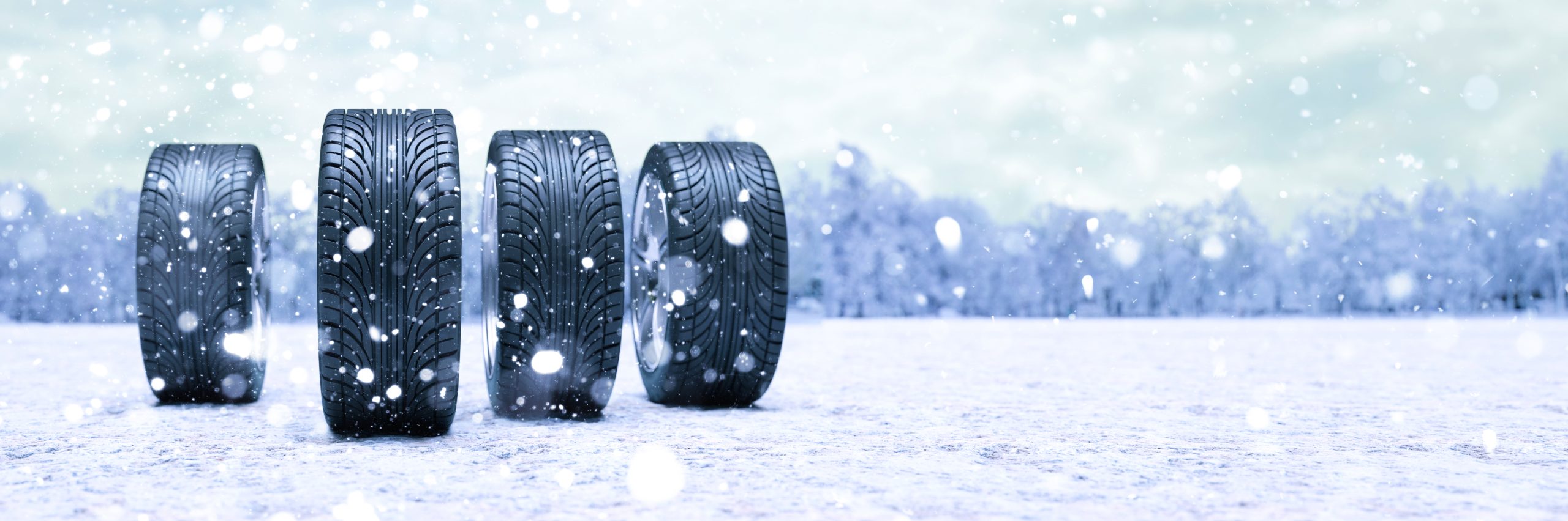 Line of tires on winter background